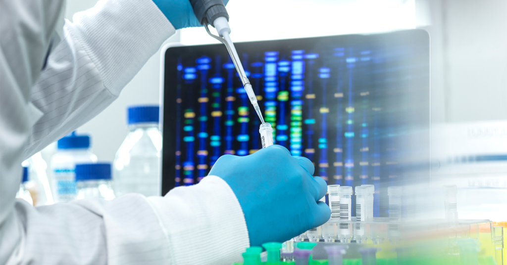 Scientist pipetting sample into a vial for DNA testing